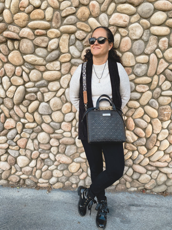 Woman wearing All black medium woven crossbody bag with mai woven strap — Tin Marin