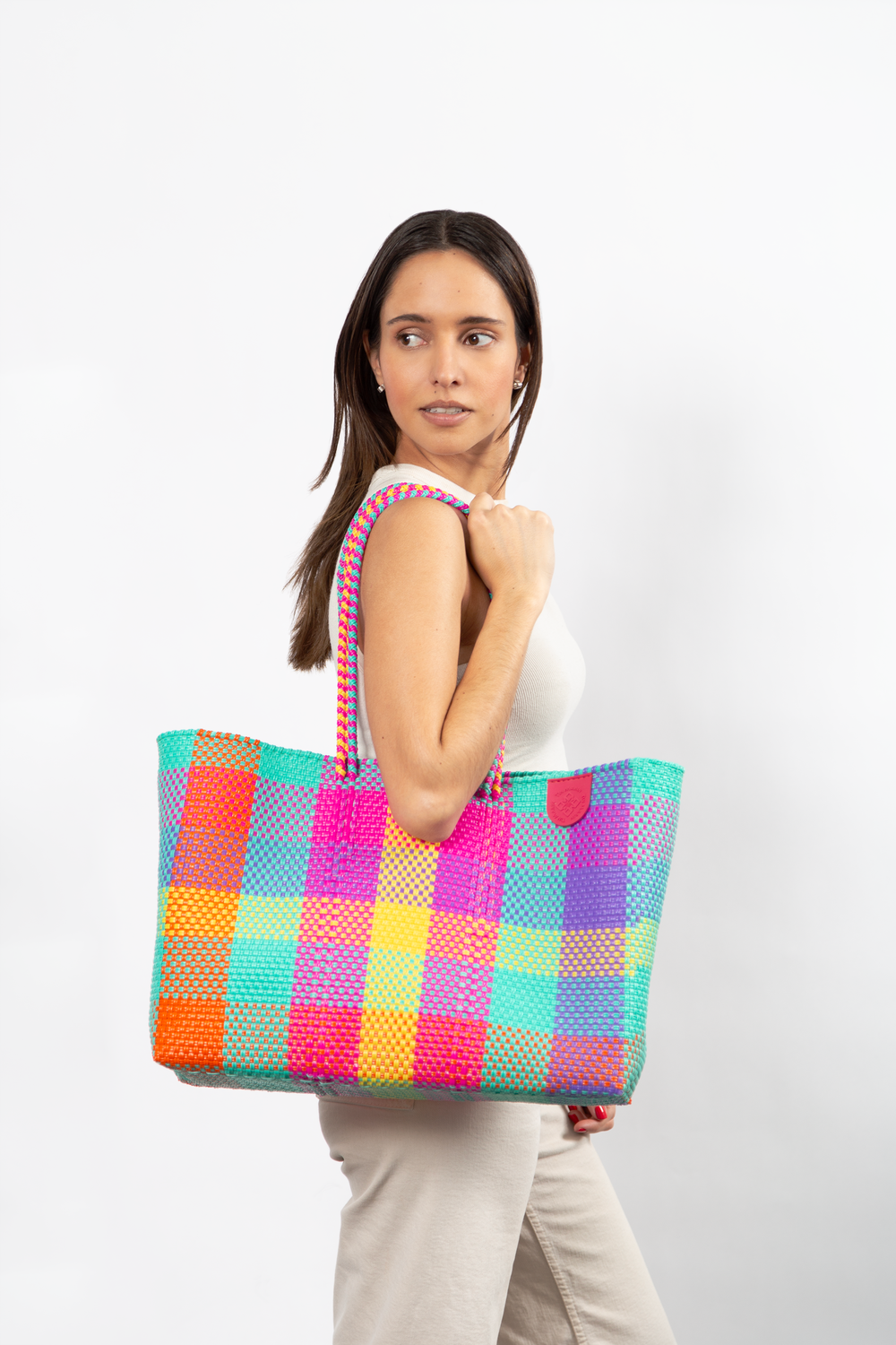 Tin Marin super tote in fiesta Design, A model carrying Tin Marin woven super tote in multicolor