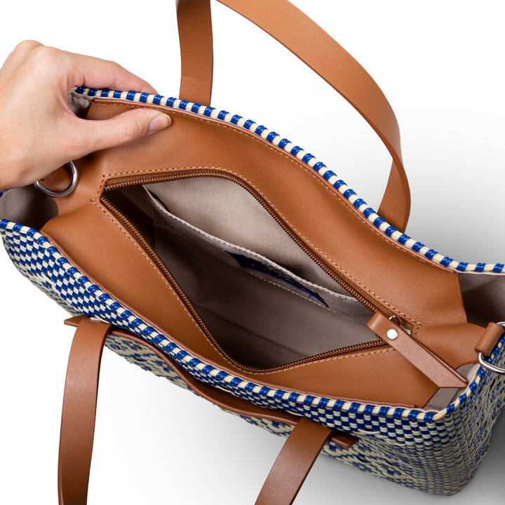 Interior view Mixte large woven crossbody bag in beige and blue with tan leather— handmade from recycled plastic in Mexico by Tin Marin