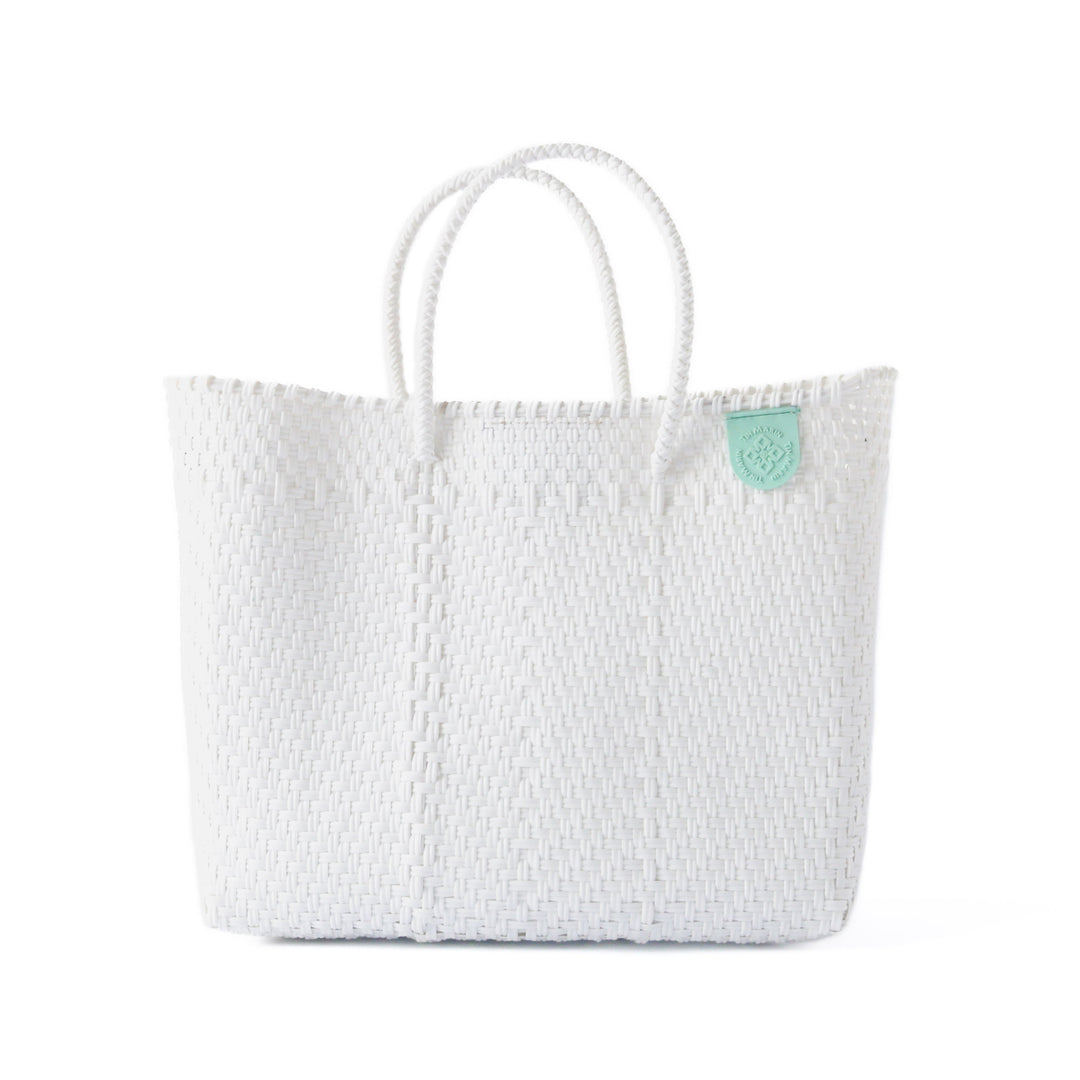 Paloma medium woven crossbody bag in white— handmade from recycled plastic in Mexico by Tin Marin