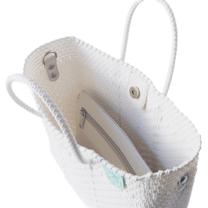 Interior of Paloma woven crossbody bag with removable zippered mesh pouch — Tin Marin