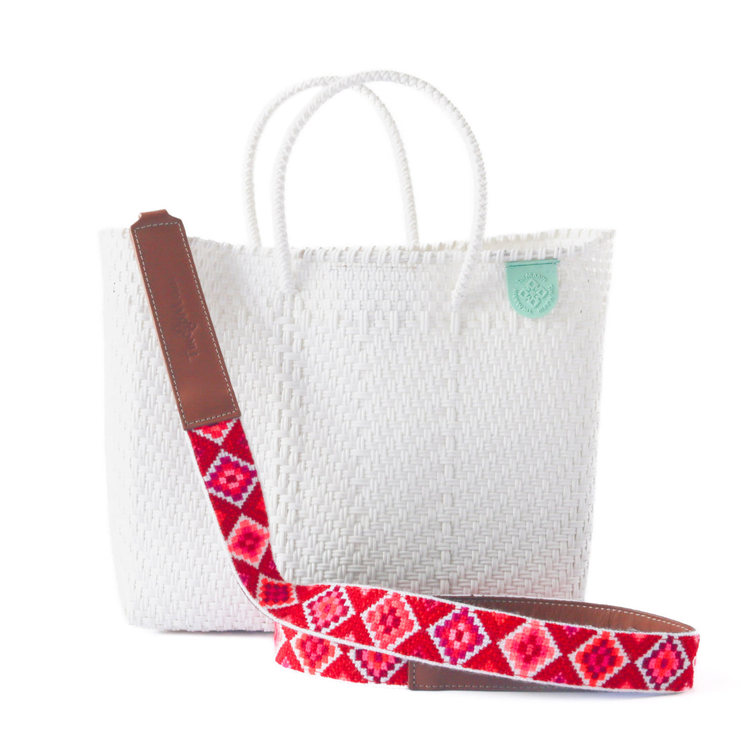 Paloma medium woven crossbody bag in white— handmade from recycled plastic in Mexico by Tin Marin with embroidered mai woven strap