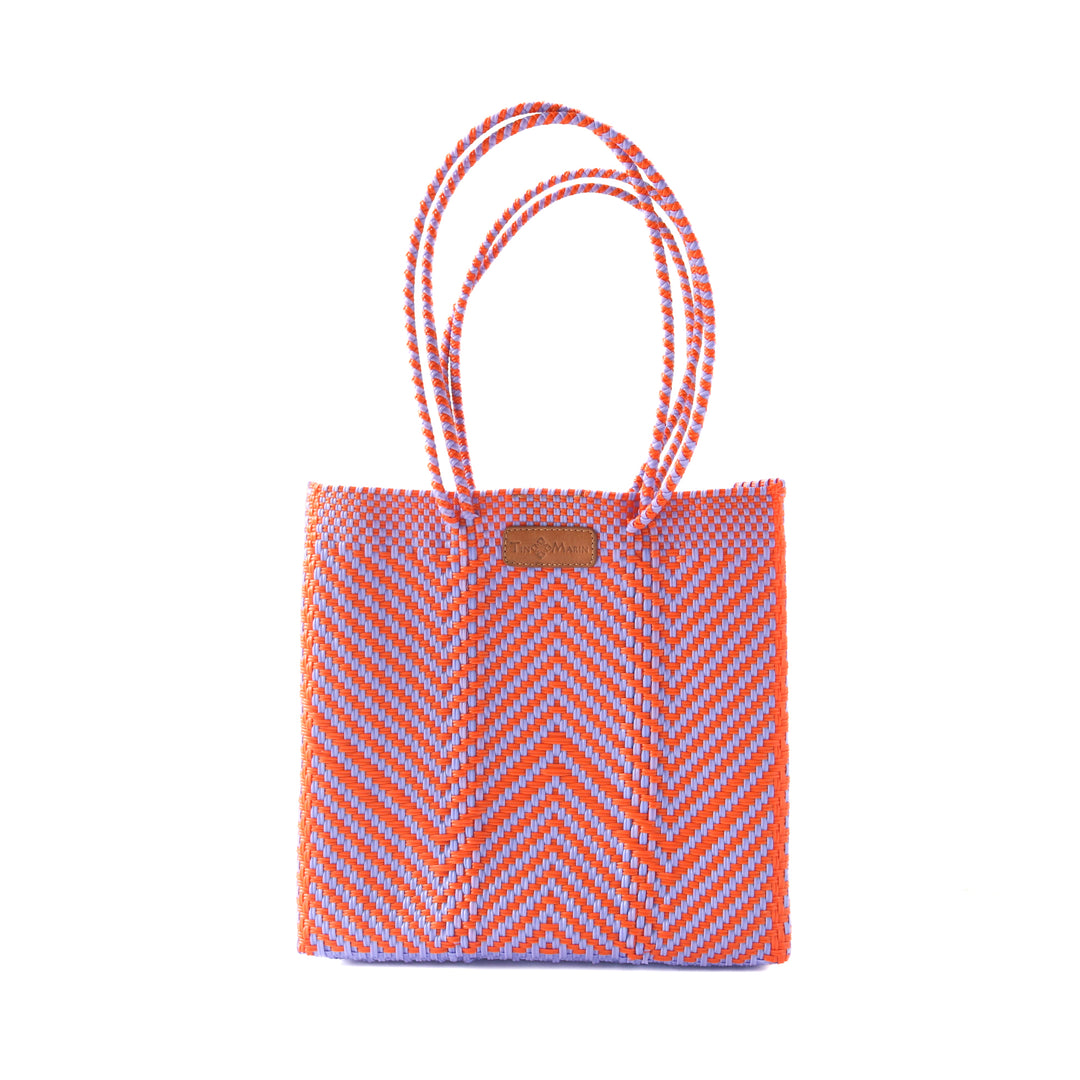 Positano woven tote in purple and orange— handmade from recycled plastic in Mexico by Tin Marin