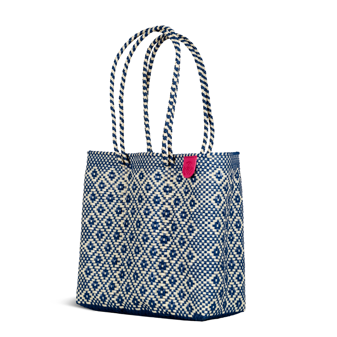 Side angle Mixte woven tote in blue and beige— handmade from recycled plastic in Mexico by Tin Marin