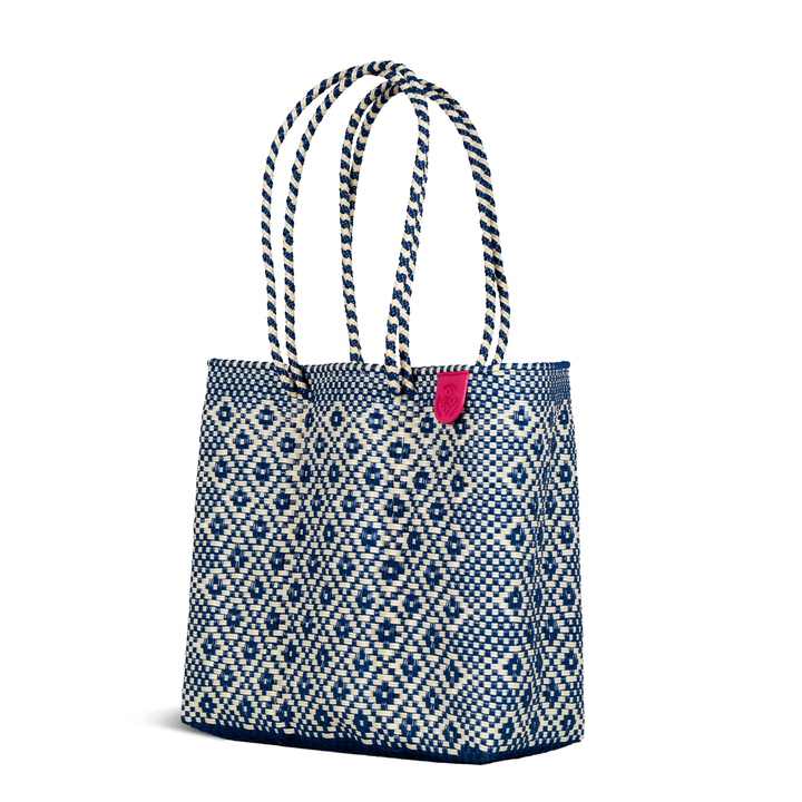 Side angle Mixte woven tote in blue and beige— handmade from recycled plastic in Mexico by Tin Marin