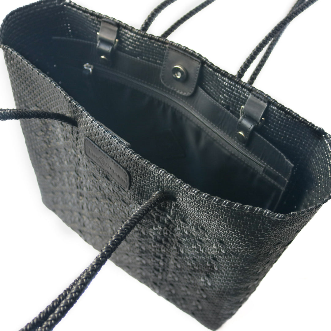 Interior view All Black woven tote in black with detachable pouch— handmade from recycled plastic in Mexico by Tin Marin