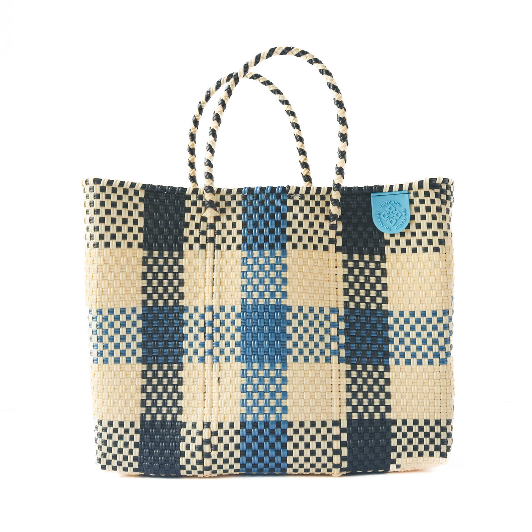 Cabo medium woven crossbody bag in blue, beige and black— handmade from recycled plastic in Mexico by Tin Marin