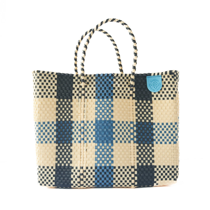 Cabo medium woven crossbody bag in blue, beige and black— handmade from recycled plastic in Mexico by Tin Marin