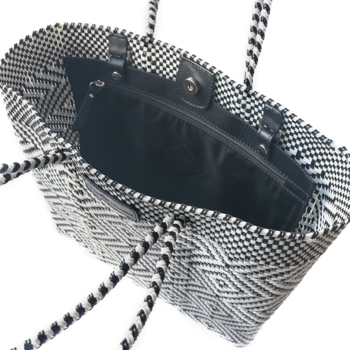 Interior view Greca woven tote in black and white with detachable pouch— handmade from recycled plastic in Mexico by Tin Marin