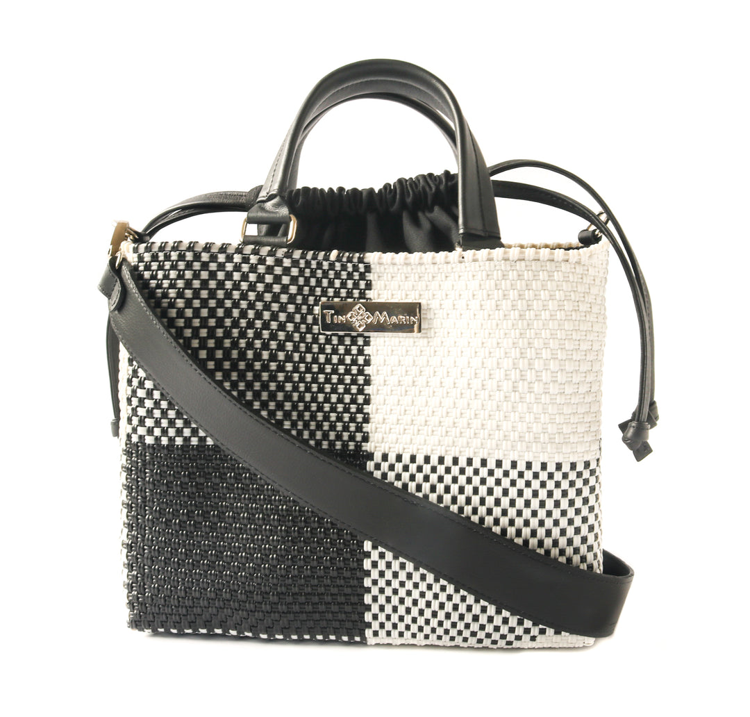 Lucy black and white woven crossbody drawstring bag — handmade from recycled plastic, Tin Marin
