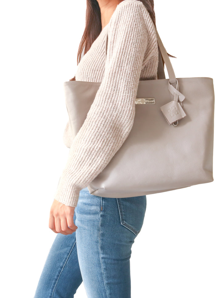 martina leather tote in taupe color, grey leather tote, laptop bag, laptop tote, work bag, travel bag, carry all bag, grained leather, artisan made.