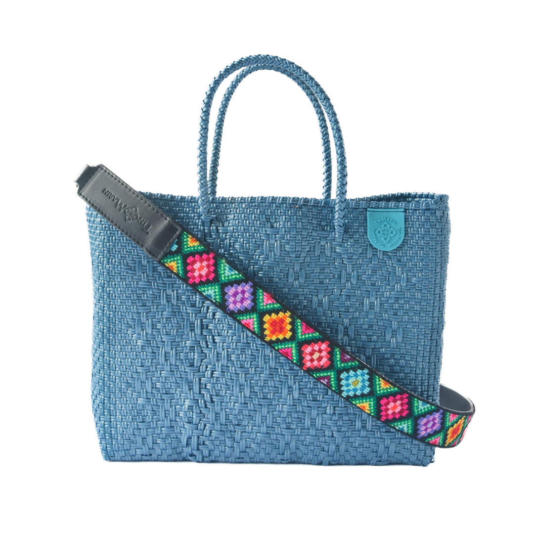Maui medium woven crossbody bag in blue— handmade from recycled plastic in Mexico by Tin Marin with embroidered mai woven strap colors