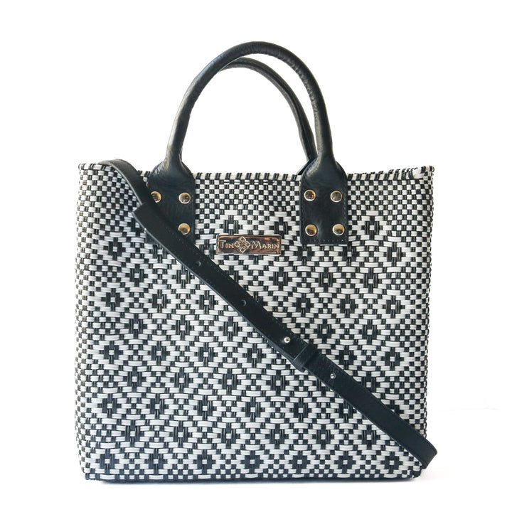 Panda large woven crossbody bag in white and black with black leather— handmade from recycled plastic in Mexico by Tin Marin