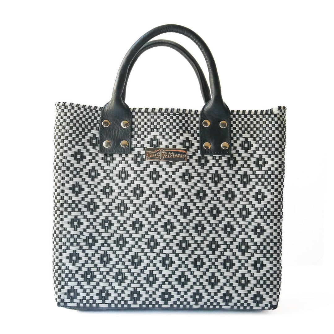 Panda large woven crossbody bag in white and black with black leather— handmade from recycled plastic in Mexico by Tin Marin