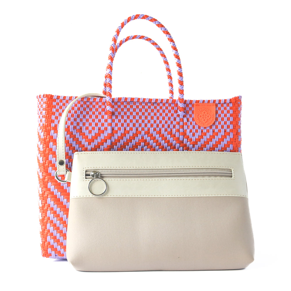 Positano medium woven crossbody bag in orange and purple— handmade from recycled plastic in Mexico by Tin Marin
