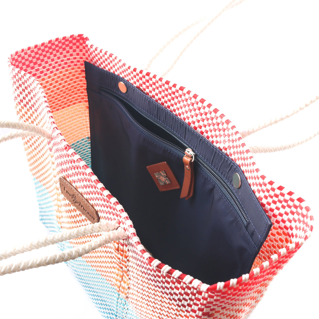 interior view sunrise woven tote in multicolor with detachable pouch— handmade from recycled plastic in Mexico by Tin Marin