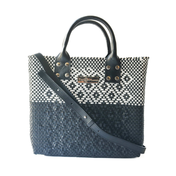 Tin Marin Black large woven crossbody bag in white and black with leather crossbody strap— handmade from recycled plastic in Mexico by Tin Marin