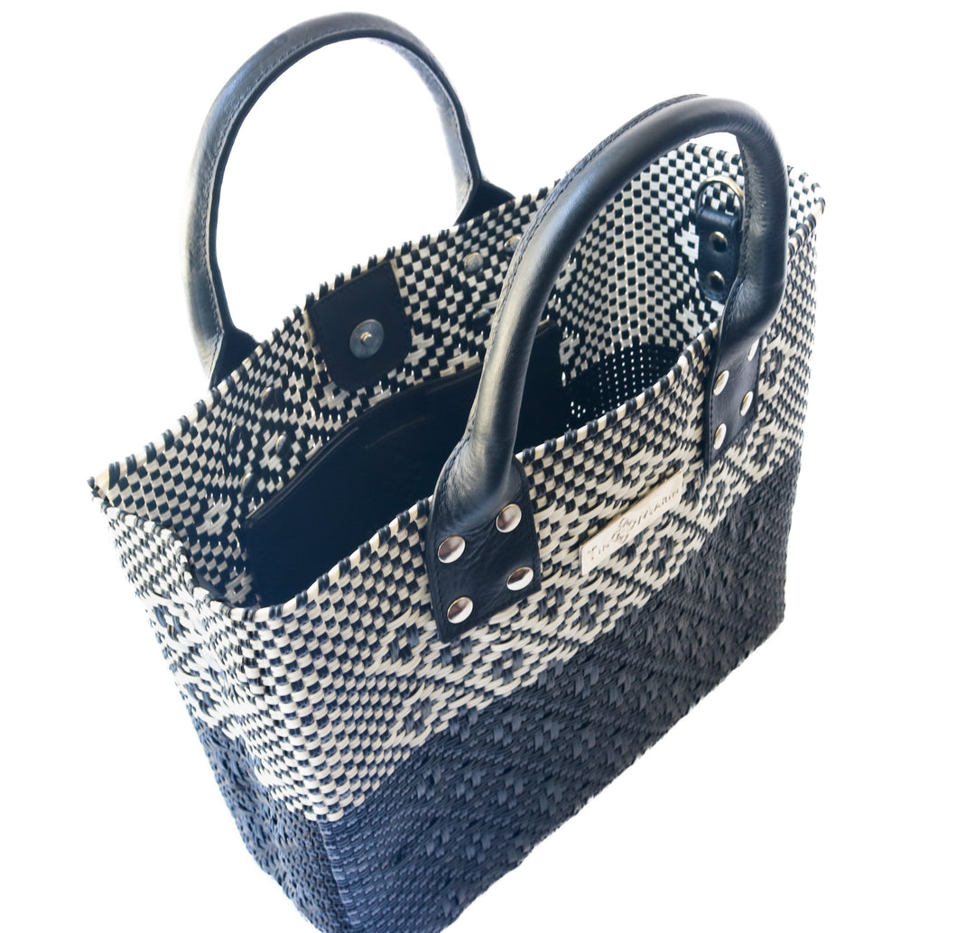 Interior view Tin Marin Black large woven crossbody bag in white and black— handmade from recycled plastic in Mexico by Tin Marin