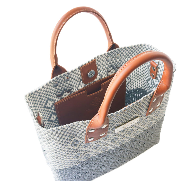 Interior view Tin Marin Grey Large woven crossbody bag in white and grey with tan leather— handmade from recycled plastic in Mexico by Tin Marin