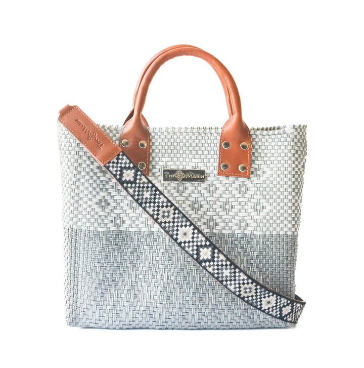 Tin Marin Grey Large woven crossbody bag in white and grey with tan leather and embroidered mai woven strap— handmade from recycled plastic in Mexico by Tin Marin
