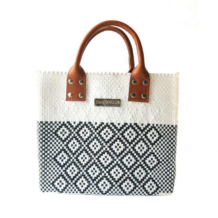 Tin Marin White Large woven crossbody bag in white and black with tan leather— handmade from recycled plastic in Mexico by Tin Marin