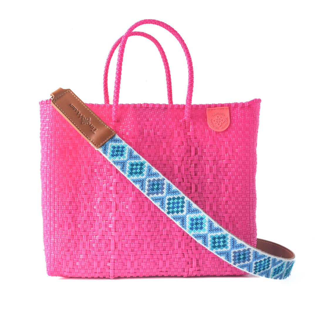 Vallarta medium woven crossbody bag in pink— handmade from recycled plastic in Mexico by Tin Marin with embroidered mai woven strap