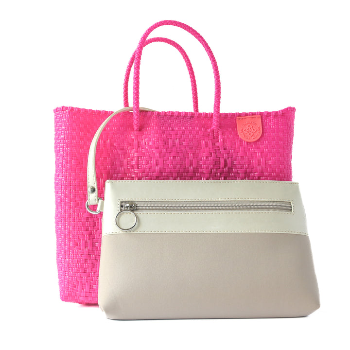 Vallarta medium woven crossbody bag in pink with detachable mesh pouch— handmade from recycled plastic in Mexico by Tin Marin